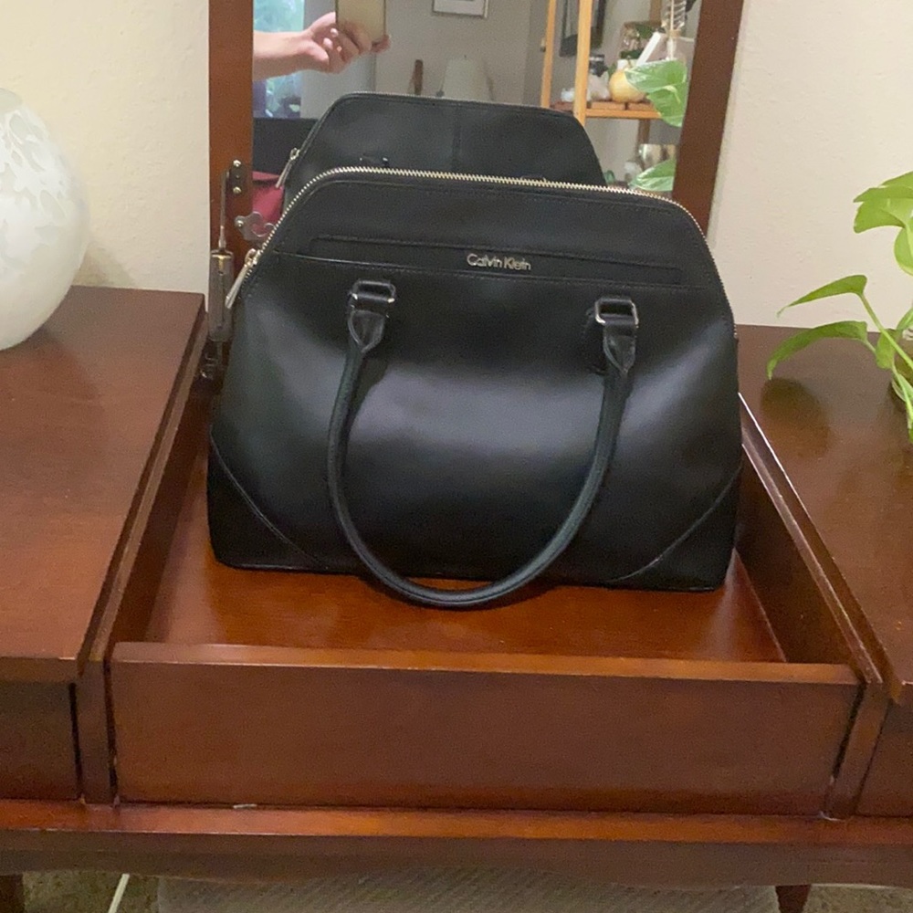 Black Calvin Klein handbag.